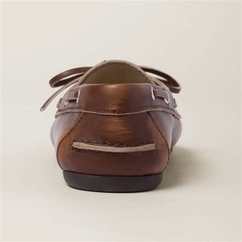 Miu Miu Unlined bleached leather loafers .